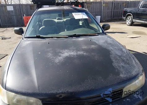 2000 Mitsubishi Mirage De z USA, uszkodzony, nr VIN JA3AY26C9YU050585